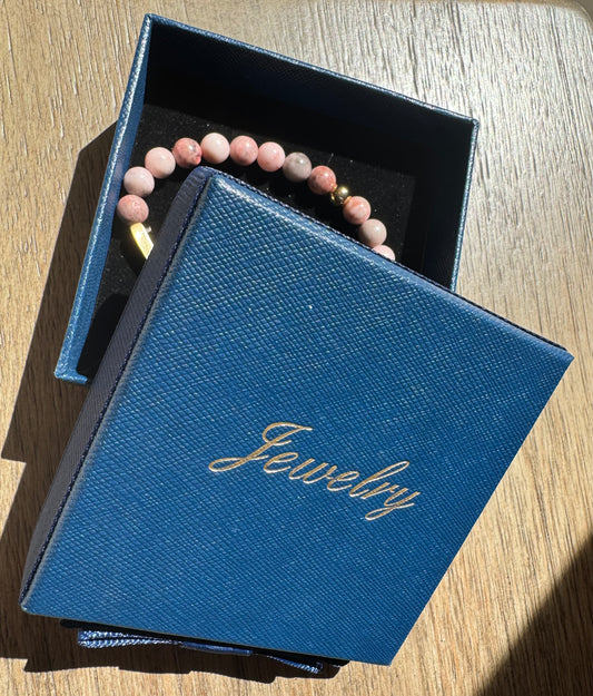Comes with blue jewelry box for convenient gift-giving.